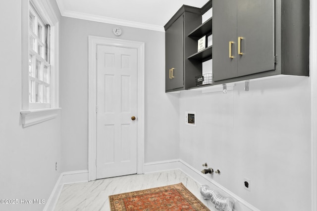 laundry room with marble finish floor, ornamental molding, cabinet space, baseboards, and hookup for a washing machine