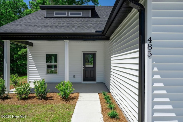 485 N Wild Rice Dr SW, Supply, NC 28462 - entrance to property featuring covered porch and a shingled roof