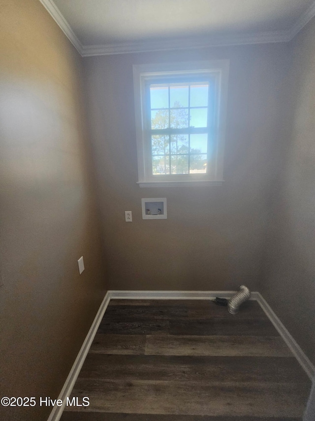 clothes washing area featuring baseboards, ornamental molding, washer hookup, laundry area, and wood finished floors