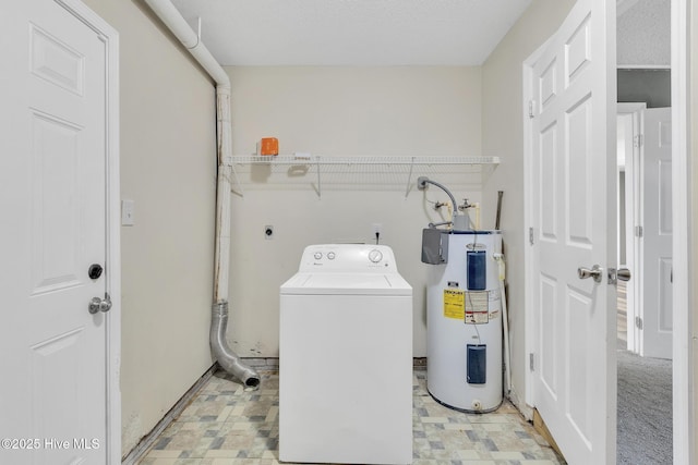 laundry room with laundry area, washer / dryer, water heater, and baseboards