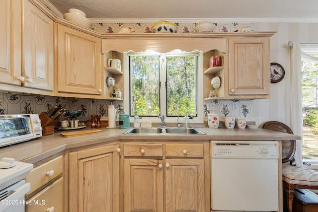 kitchen featuring light brown cabinets, a sink, open shelves, light countertops, and dishwasher