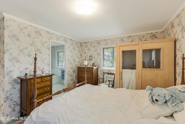 bedroom featuring a textured ceiling, ensuite bath, crown molding, and wallpapered walls