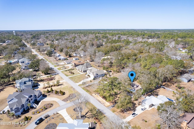 birds eye view of property with a residential view