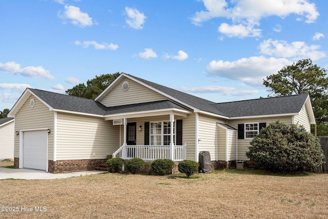 view of front of home featuring a front lawn, a porch, an attached garage, and a shingled roof