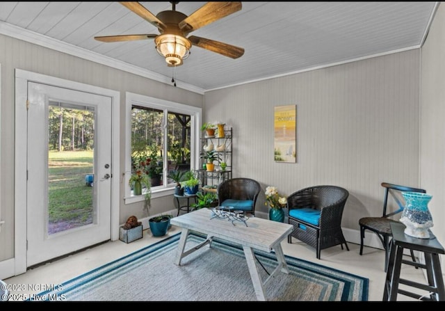 sunroom / solarium with ceiling fan