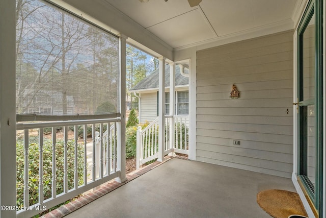 unfurnished sunroom featuring plenty of natural light