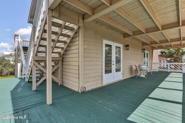 deck with stairway and french doors