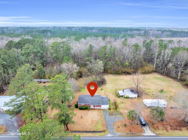 drone / aerial view with a forest view