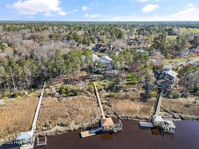 1807 Baywater Ct SE, Bolivia, NC 28422 - aerial view featuring a wooded view and a water view