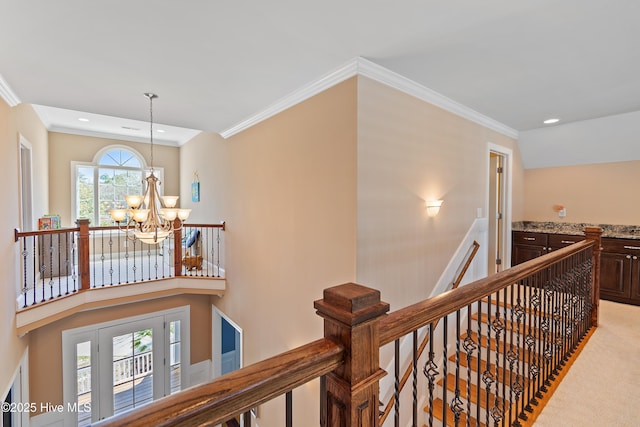1807 Baywater Ct SE, Bolivia, NC 28422 - corridor with an upstairs landing, recessed lighting, ornamental molding, and an inviting chandelier