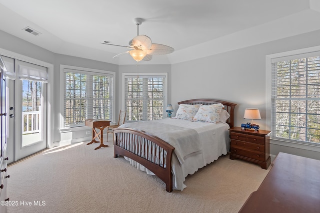 1807 Baywater Ct SE, Bolivia, NC 28422 - bedroom with access to exterior, baseboards, visible vents, carpet, and ceiling fan