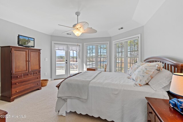 1807 Baywater Ct SE, Bolivia, NC 28422 - bedroom featuring light carpet, access to outside, french doors, and visible vents