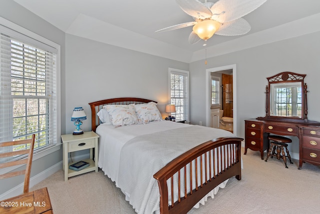 1807 Baywater Ct SE, Bolivia, NC 28422 - bedroom featuring multiple windows, baseboards, and light carpet
