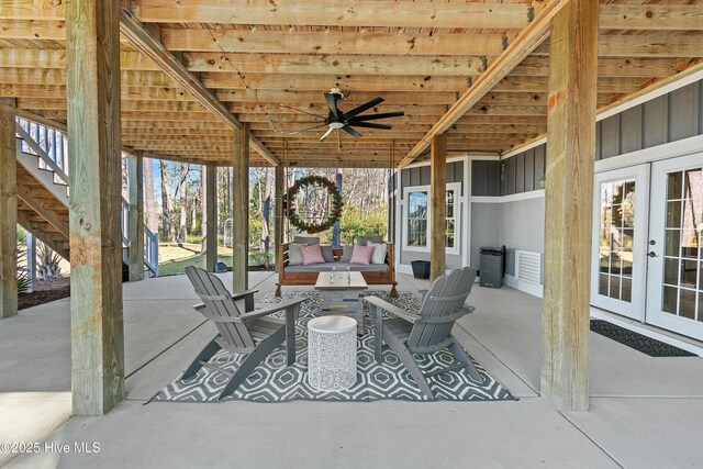 1807 Baywater Ct SE, Bolivia, NC 28422 - view of patio / terrace featuring ceiling fan, french doors, and stairway