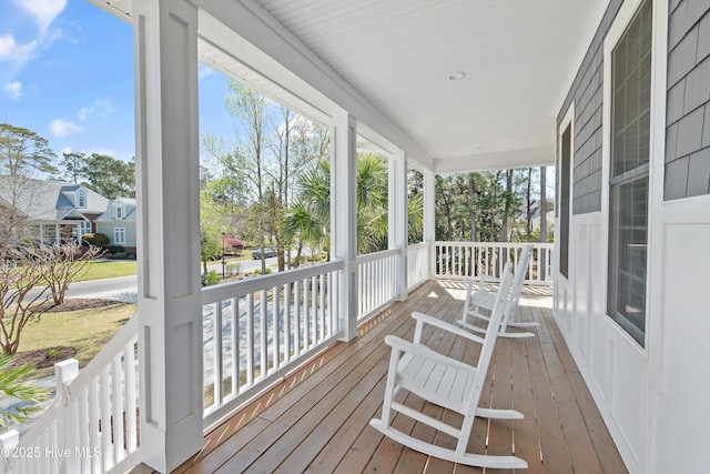 1807 Baywater Ct SE, Bolivia, NC 28422 - wooden terrace featuring covered porch