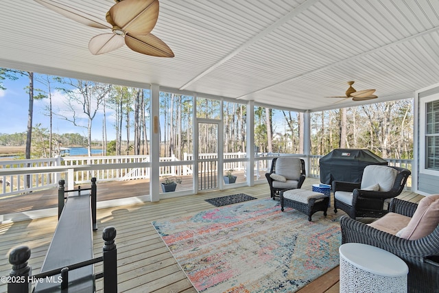 1807 Baywater Ct SE, Bolivia, NC 28422 - sunroom featuring a water view, ceiling fan, and an outdoor hangout area