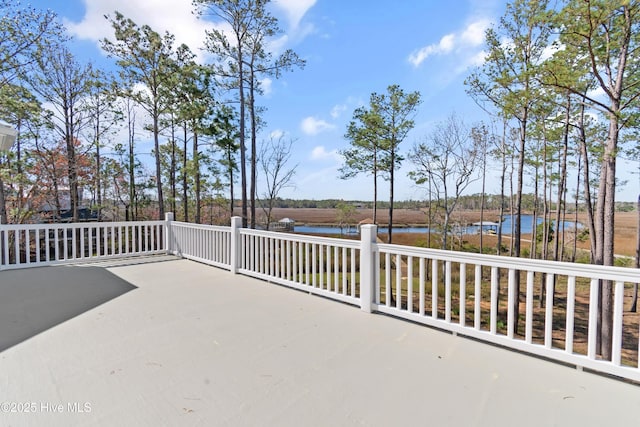1807 Baywater Ct SE, Bolivia, NC 28422 - view of patio / terrace featuring a water view