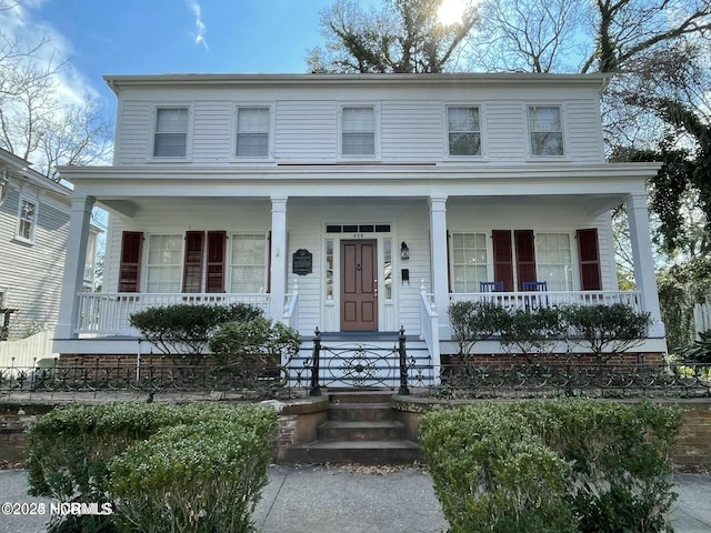 view of front of home featuring covered porch