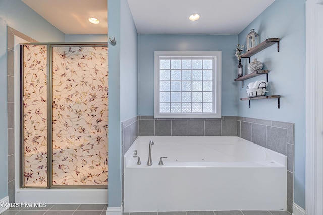 full bath featuring tile patterned flooring, recessed lighting, a stall shower, and a garden tub