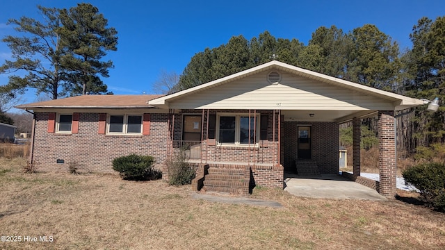 single story home with brick siding, covered porch, and a front lawn