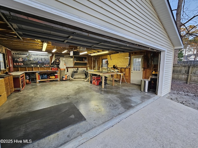 garage with fence