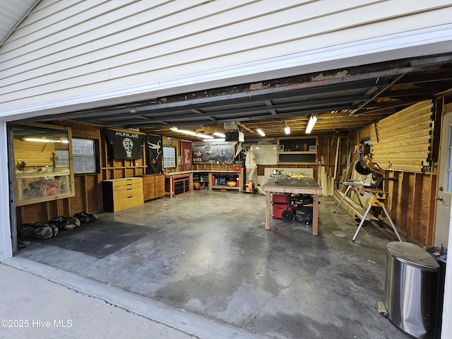 garage with a workshop area