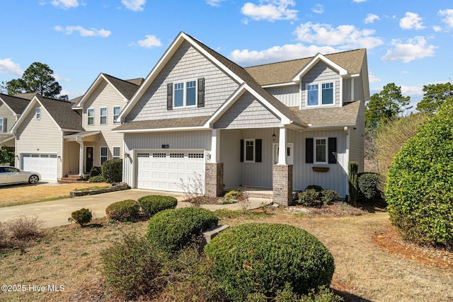 126 Lightwater Dr, Aberdeen, NC 28315 - craftsman-style house with a shingled roof, an attached garage, board and batten siding, covered porch, and driveway