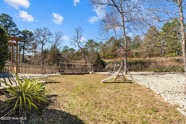 126 Lightwater Dr, Aberdeen, NC 28315 - view of yard with a playground and fence