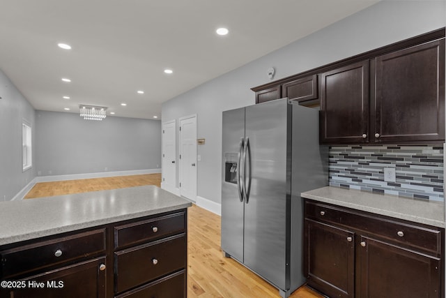 126 Lightwater Dr, Aberdeen, NC 28315 - kitchen featuring stainless steel fridge with ice dispenser, backsplash, recessed lighting, and dark brown cabinets