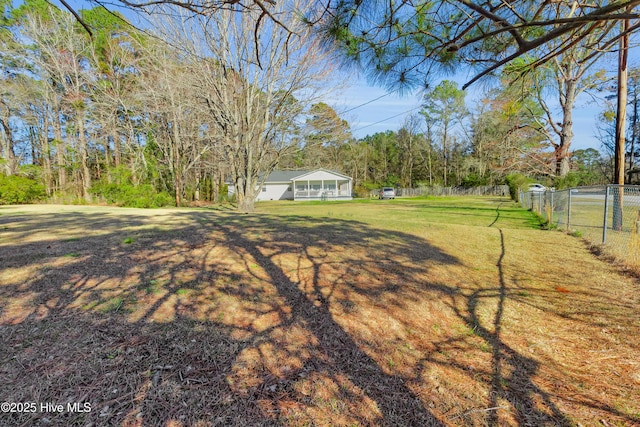 view of yard featuring fence