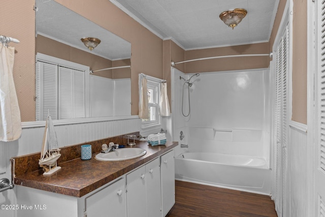 209 N 8th St, Morehead City, NC 28557 - full bath with shower / washtub combination, vanity, wood finished floors, ornamental molding, and a closet