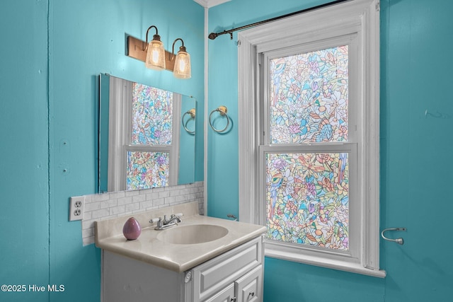 209 N 8th St, Morehead City, NC 28557 - bathroom featuring vanity and tasteful backsplash