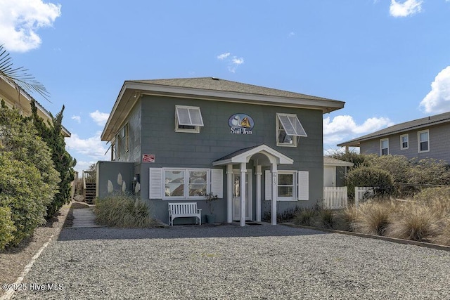 view of front of property with fence