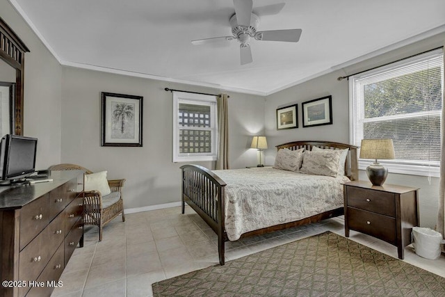 bedroom with light tile patterned floors, baseboards, ornamental molding, and ceiling fan