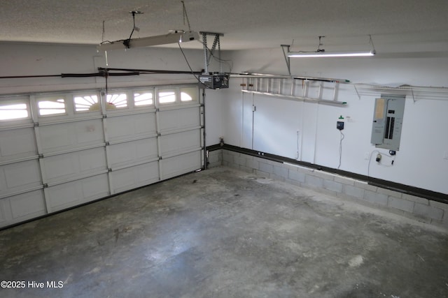 garage with electric panel and a garage door opener