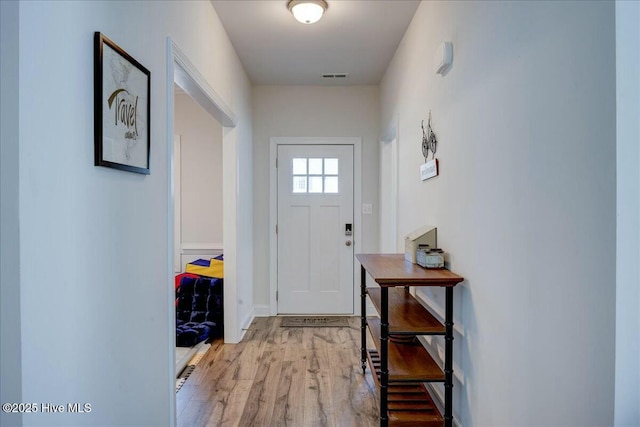 entryway featuring visible vents and light wood-type flooring