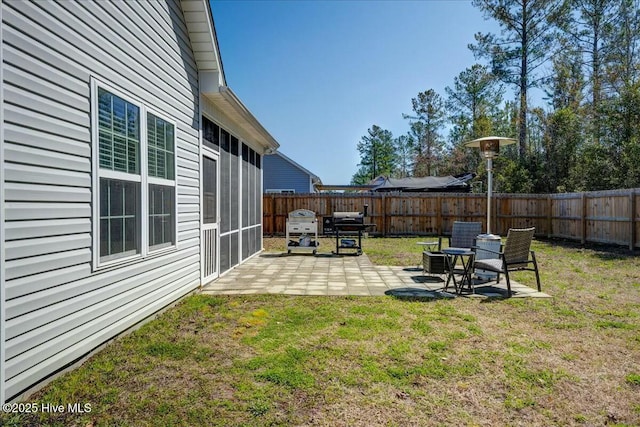 view of yard featuring a fenced backyard and a patio