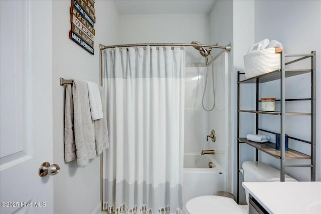 full bath with vanity, toilet, and shower / bath combo with shower curtain