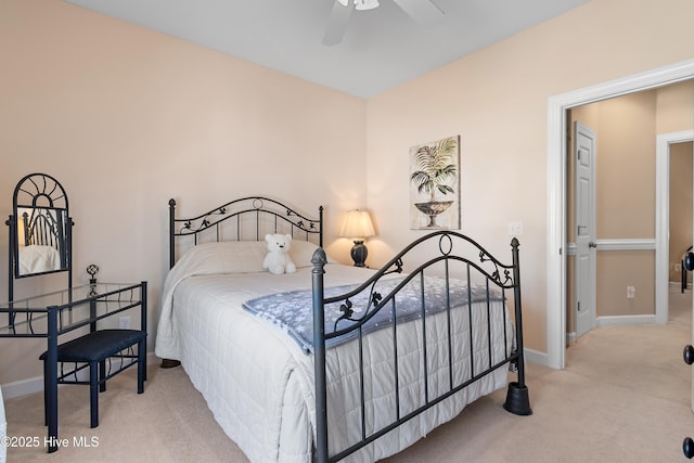 bedroom with baseboards, a ceiling fan, and carpet flooring