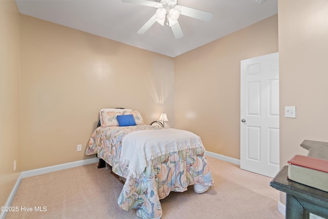 bedroom featuring baseboards, carpet floors, and ceiling fan