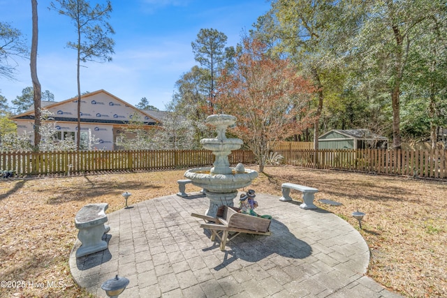 view of patio with a fenced backyard