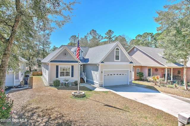 traditional-style house featuring driveway and an attached garage