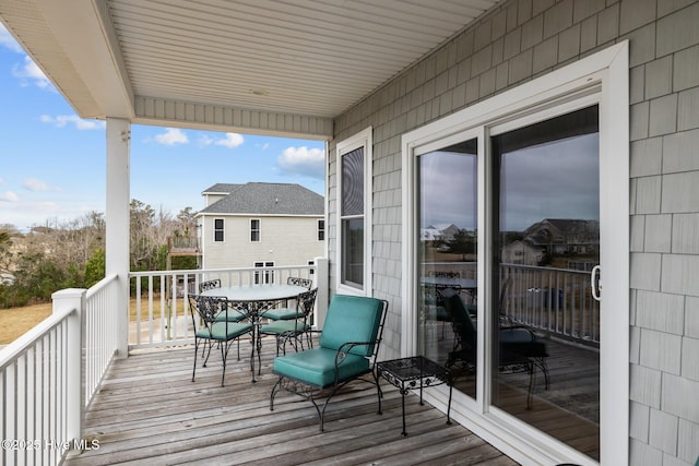 deck featuring outdoor dining space