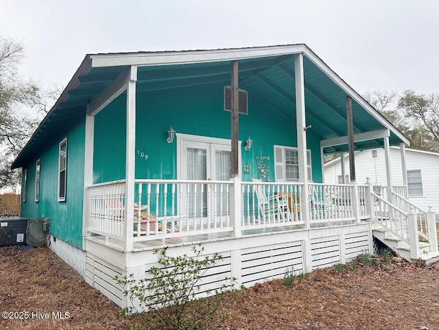 back of house with a porch