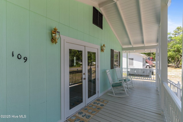 109 NE 17th St, Oak Island, NC 28465 - porch with french doors