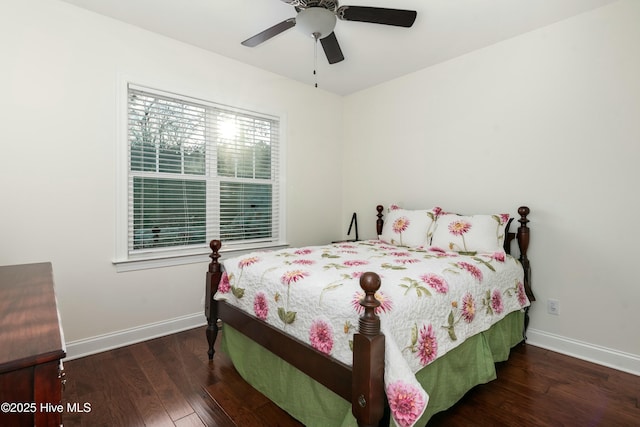 bedroom with ceiling fan, baseboards, and hardwood / wood-style flooring