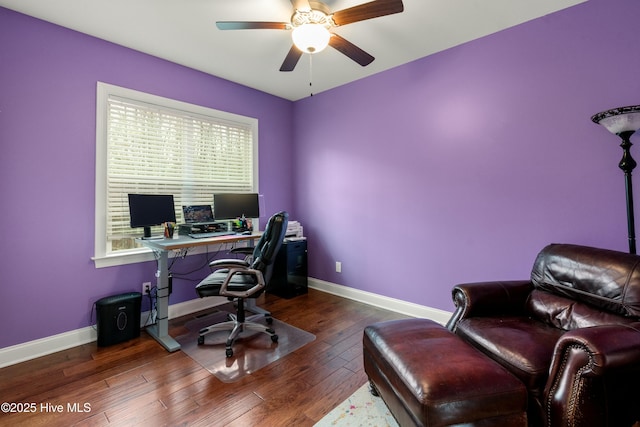 office with a ceiling fan, wood finished floors, and baseboards