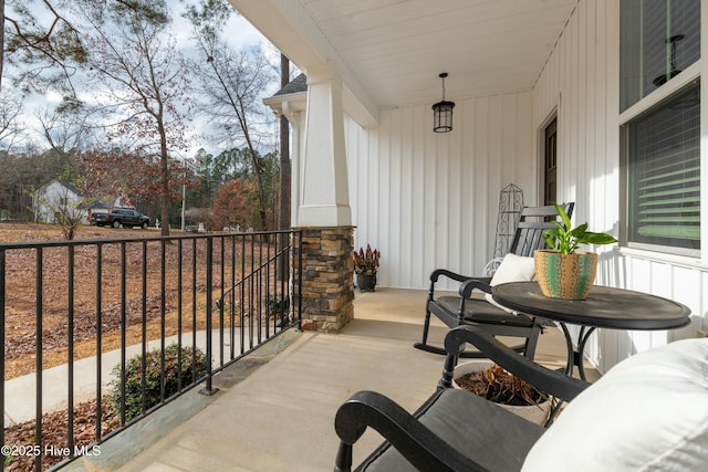 balcony featuring a porch