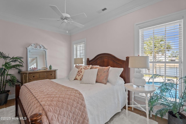 5151 Creswell Dr, Leland, NC 28451 - bedroom featuring light wood finished floors, ornamental molding, and a ceiling fan