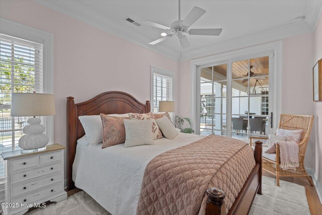 5151 Creswell Dr, Leland, NC 28451 - bedroom featuring access to exterior, ornamental molding, ceiling fan, and light wood-style floors